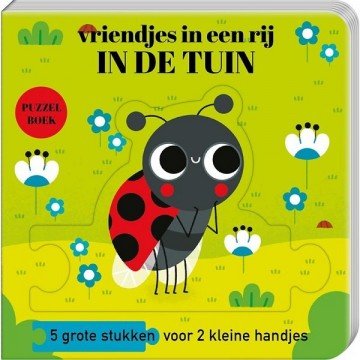 Puzzelboek in de tuin